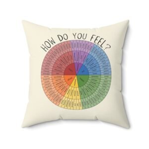Colorful feelings wheel on a white pillow for emotional literacy tools.
